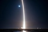 SpaceX moonlit launch marks year’s midway point as pace slows on Space Coast
