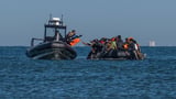 French plans to intercept migrant boats at sea are now 'in jeopardy due to political crisis in Paris'