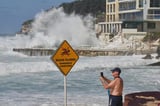 Sydney homes flooded and infrastructure damaged as swell combined with king tide to batter the coast