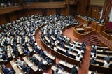 Japan enacts law centralizing intelligence gathering, rights fears remain