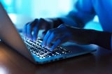 AI Firms Debate Putting Cyber Tests Online After Model Hacks