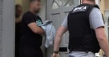 Four arrested after dawn raids targeting suspected people smugglers