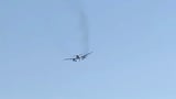 American Airlines flight returns to Vegas airport due to mechanical issue, videos show bursts of flames shooting out of engine