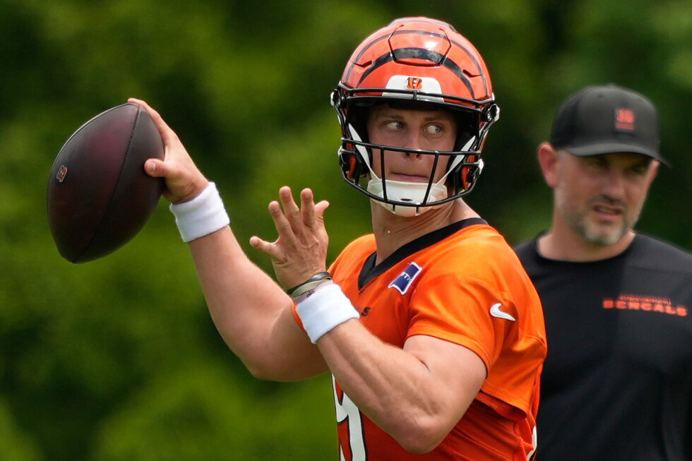 Bengals restructure Joe Burrow's contract to free up cap space, AP source says | AP News
