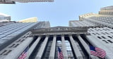 Wall Street rises to a record as it waits for the Fed - Los Angeles Times