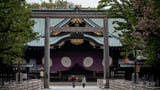 Japan PM hopeful avoids war shrine visit amid political wrangle