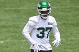 Jets’ Qwan’Tez Stiggers taken away from practice in ambulance