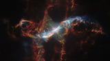 Hubble Telescope sees 'stellar volcano' erupt in amazing colors (video, photo)