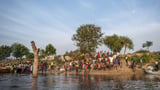 As flooding becomes a yearly disaster in South Sudan, thousands survive on the edge of a canal