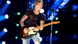 Keith Urban says 'High' is about order and chaos, with songs about love, life and his late father