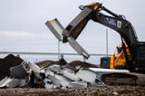 Salvage crews race against the clock to remove massive chunks of fallen Baltimore bridge