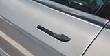 Tesla under investigation for door handles that trap people inside