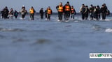 French rescue 119 migrants trying to cross to England