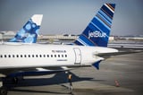 S&P and Moody's downgrade JetBlue amid $3 billion debt raise, shares sink