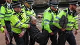 Palestine Action supporters are arrested after staging protest outside Labour conference - months after 'terror group' was banned by the government