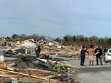 Residents begin going through the rubble after tornadoes hammer parts of Nebraska and Iowa