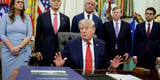 Trump signs sweeping new Russia and Iran sanctions law