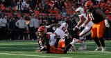 Joe Burrow throws remarkable TD pass to Tee Higgins while falling horizontal to his knees