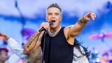 Robbie Williams forced to cancel final tour gig in Turkey over terror fears as hitmaker tells fans decision to axe performance 'was beyond our control'