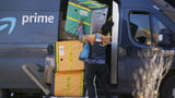 Amazon spends $1 billion to increase pay and lower health care costs for US workers | AP News