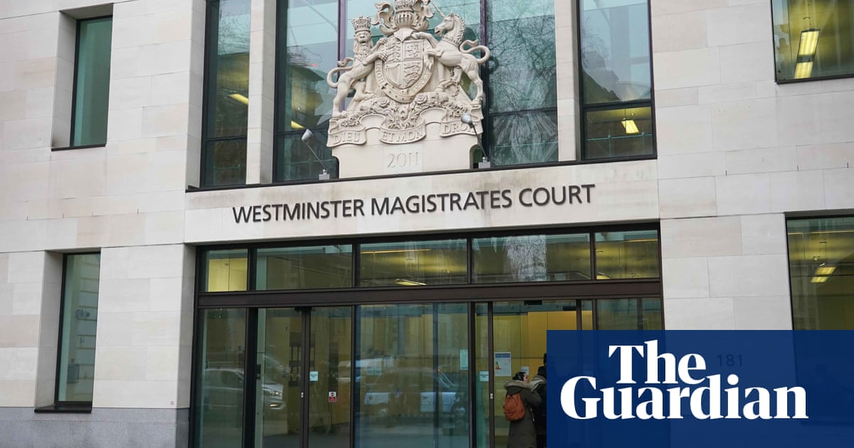 Two men in UK charged with spying for China