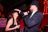 Travis Kelce Gives Taylor Swift the 'Last 22 Hat' at the 'Giant Surprise' Eras Tour Party He Threw