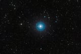 Faint new planet is revealed around a young star after a decade in hiding