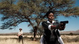 ‘The Man With the Crooked Arm’ Creator Perivi Katjavivi on Using Genre to Revisit Germany’s Colonial Crimes in Africa