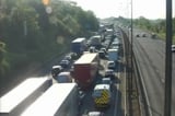 M25 closed after tanker overturns in crash with lorry as drivers face long delays and cops warn of...