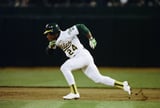 Rickey Henderson, MLB’s stolen-base king, dies at 65