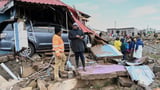 Rescuers in South Africa search for the missing after floods as the death toll rises to 57