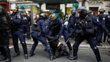 Workers take to the streets in worldwide May Day protests