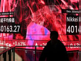 Japan’s Nikkei stock index passes 40,000 for first time amid AI fanfare