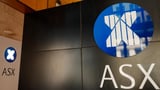 ASX tumbles on big bank, Woodside woes