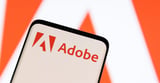 Adobe raises annual forecasts, CFO exit fans uncertainty over growth strategy