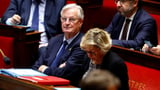 France’s minority government survives no-confidence vote as far right refuses to back motion