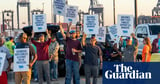 US longshoremen reach tentative deal with ports and shippers to avert strike