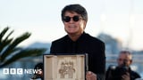 Palme d'Or-winning director Jafar Panahi returns home