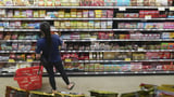 About half of US adults say grocery costs cause major stress, poll finds | AP News