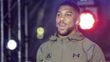 Joshua bids to emulate Muhammad Ali as 3-time heavyweight champ by beating Dubois in front of 95,000