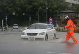 Heavy rain and flooding in north-central Japan strands people and vehicles