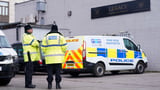Police remove 34 bodies from English funeral home and arrest 2 for fraud and preventing burial