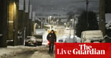 UK weather: ‘extensive flooding’ closes M5 in Gloucestershire as heavy snow and ice causes travel chaos across country – live