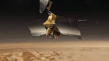 Spacecraft spots NASA rover driving through Mars' desert