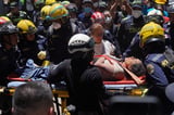 Rescuers race against time to find survivors after Colombia earthquake | AP News
