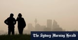 Sydney dust storm blankets city in yellow haze