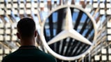 Mercedes shares fall 5% after full-year earnings halve on tariffs, China competition