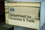 Business Secretary Makes First Official Washington Visit