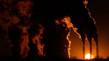 Climate report says world won't get as hot as feared but will pass warming limit