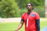 "That’s a pick 6 in game": NFl fans react to Cam Ward's pass to Elic Ayomanor during Titans minicamp